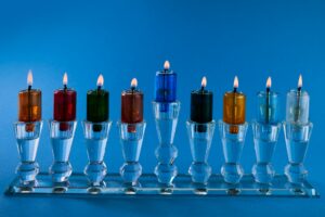 Image of jewish holiday Hanukkah with menorah, traditional candelabra
