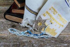 Prayer Shawl - Tallit, jewish religious symbol. Selective focus Jewish holiday