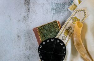 Tallit and shofar jewish religious symbol Orthodox Jewish prays at the praying book
